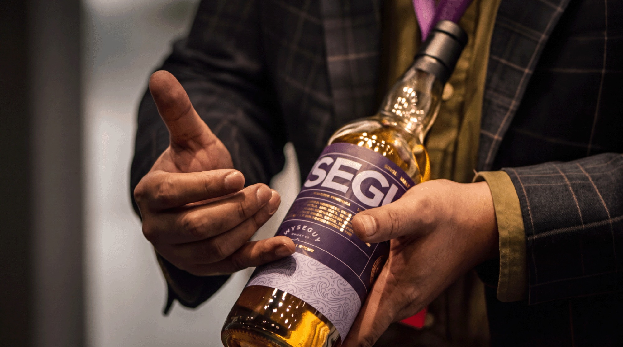 A BitCask client holding a bespoke single cask bottling